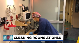 EVS worker cleaning rooms at OHSU